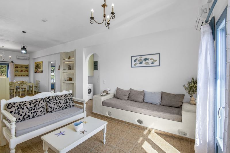 Olive apartment, Flora Apartments Paros – living room with built-in sofas